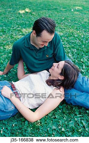 Stock Photo - A couple in the park. Fotosearch
