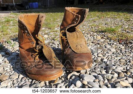 A couple of old leather boots View Large Photo Image Stock Photo - A couple of old leather boots. Fotosearch