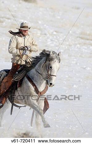 A cowboy out for a winter ride, Shell, Wyoming, Usa View Large Photo Image Stock Image - A cowboy out for a winter ride, Shell, Wyoming, Usa. Fotosearch