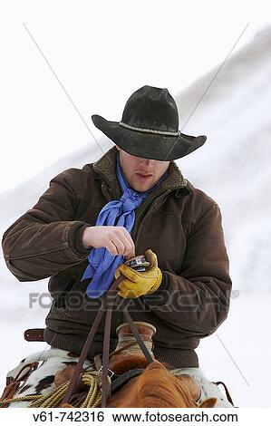A cowboy taking a pinch of snuff, Shell Wyoming View Large Photo Image Stock Photograph - A cowboy taking a pinch of snuff, Shell Wyoming. Fotosearch