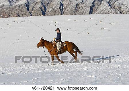 A cowgirl out for a winter ride, Shell, Wyoming, Usa View Large Photo Image Stock Image - A cowgirl out for a winter ride, Shell, Wyoming, Usa. Fotosearch