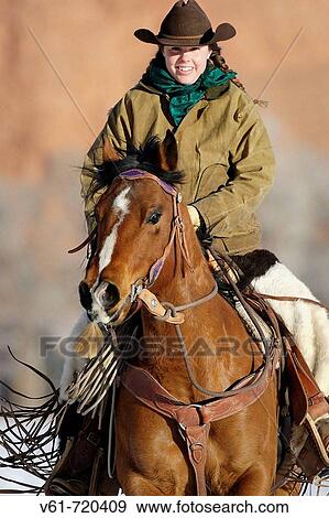 A cowgirl out for a winter ride, Shell, Wyoming, Usa View Large Photo Image Stock Photo - A cowgirl out for a winter ride, Shell, Wyoming, Usa. Fotosearch