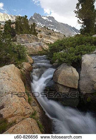 A CREEK BELOW SAILOR LAKE WEAVES ITS WAY THROUGH THE SIERRA NEVADA MOUNTAINS IN CALIFORNIA View Large Photo Image Stock Photograph - A CREEK BELOW SAILOR LAKE WEAVES ITS WAY THROUGH THE SIERRA NEVADA MOUNTAINS IN CALIFORNIA. Fotosearch