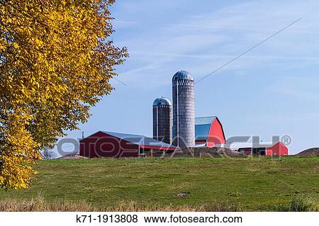 A dairy farm with barns and silo near Minocqua, Wisconsin, USA View Large Photo Image Stock Photo - A dairy farm with barns and silo near Minocqua, Wisconsin, USA. Fotosearch