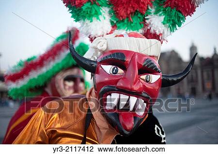 A dancer from Chocaman, Veracruz, dressed as a red devil, dances the Danza de los Santiagos at the pilgrimage to Our Lady of Guadalupe Basilica in Mexico City, Mexico, December 8, 2013. View Large Photo Image Stock Image - A dancer from Chocaman, Veracruz, dressed as a red devil, dances the Danza de los Santiagos at the pilgrimage to Our Lady of Guadalupe Basilica in Mexico City, Mexico, December 8, 2013.. Fotosearch