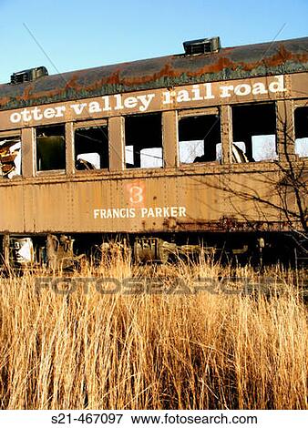 Stock Photo - A decaying railroad car is photographed on a bright November day.. Fotosearch