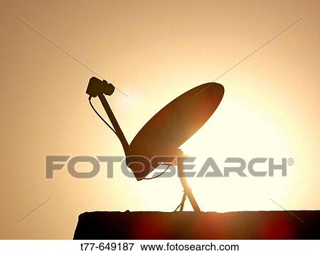 A dish antenna of a television set on a building terrace. Pune, Maharashtra, India. View Large Photo Image Stock Photo - A dish antenna of a television set on a building terrace. Pune, Maharashtra, India.. Fotosearch