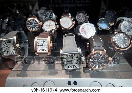 A display of watches with over-sized fashionable faces is seen in the window of a jewelry store in New York View Large Photo Image Picture - A display of watches with over-sized fashionable faces is seen in the window of a jewelry store in New York. Fotosearch