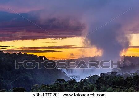 A distant view of Iguaz Falls, Iguaz Falls National Park, Misiones, Argentina, South America. View Large Photo Image Stock Image - A distant view of Iguaz Falls, Iguaz Falls National Park, Misiones, Argentina, South America.. Fotosearch