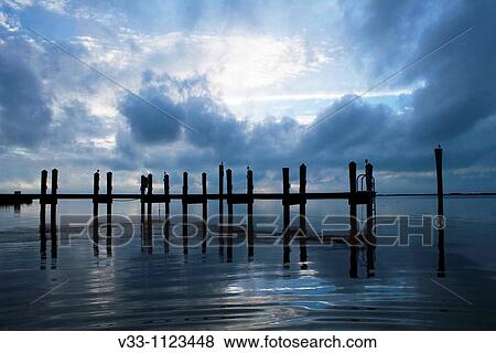 A dock on the Floriday Bay in the Keys at sunset View Large Photo Image Stock Photo - A dock on the Floriday Bay in the Keys at sunset. Fotosearch