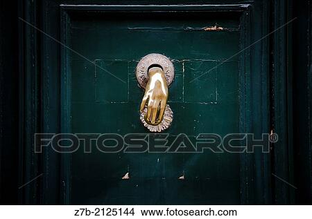 A doorhandle on a green door in a street of Madrid, Spain. View Large Photo Image Picture - A doorhandle on a green door in a street of Madrid, Spain.. Fotosearch