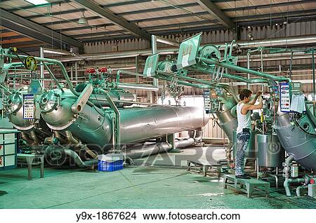A factory and research laboratory where fabric is researched, produced and manufactured View Large Photo Image Picture - A factory and research laboratory where fabric is researched, produced and manufactured. Fotosearch