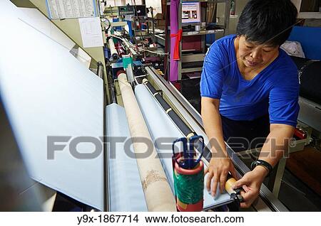 A factory and research laboratory where fabric is researched, produced and manufactured View Large Photo Image Picture - A factory and research laboratory where fabric is researched, produced and manufactured. Fotosearch