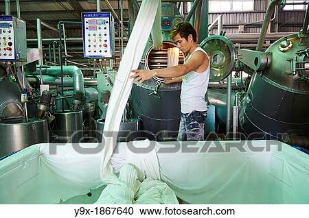 A factory and research laboratory where fabric is researched, produced and manufactured View Large Photo Image Stock Image - A factory and research laboratory where fabric is researched, produced and manufactured. Fotosearch