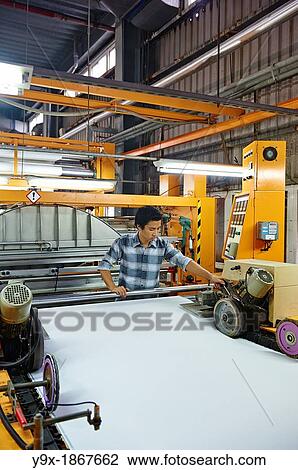 A factory and research laboratory where fabric is researched, produced and manufactured View Large Photo Image Stock Image - A factory and research laboratory where fabric is researched, produced and manufactured. Fotosearch