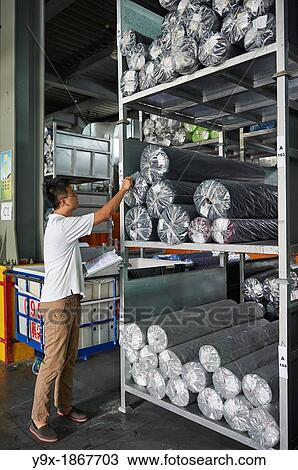 A factory and research laboratory where fabric is researched, produced and manufactured View Large Photo Image Stock Image - A factory and research laboratory where fabric is researched, produced and manufactured. Fotosearch