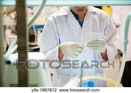 A factory and research laboratory where fabric is researched, produced and manufactured View Large Photo Image Stock Image - A factory and research laboratory where fabric is researched, produced and manufactured. Fotosearch