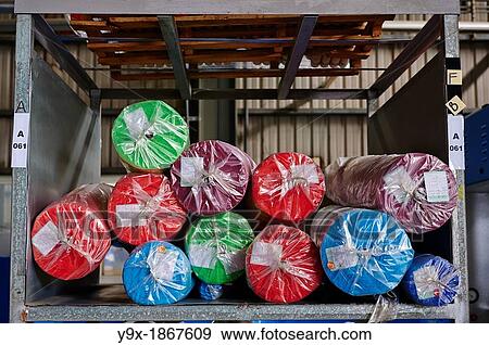 Stock Photo - A factory and research laboratory where fabric is researched, produced and manufactured. Fotosearch
