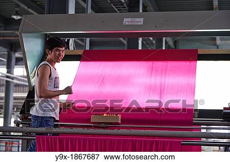 Stock Photo - A factory and research laboratory where fabric is researched, produced and manufactured. Fotosearch