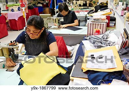 Stock Photo - A factory and research laboratory where fabric is researched, produced and manufactured. Fotosearch
