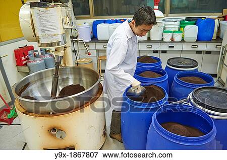Stock Photo - A factory and research laboratory where fabric is researched, produced and manufactured. Fotosearch