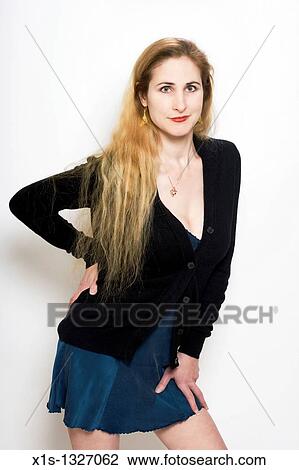 A fair skinned woman with very long blond hair View Large Photo Image Stock Image - A fair skinned woman with very long blond hair. Fotosearch