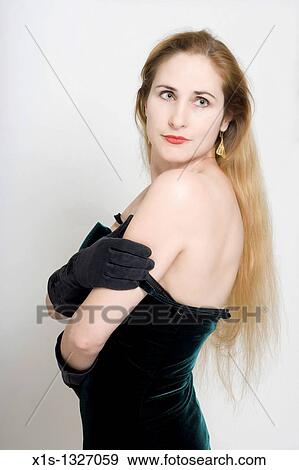 A fair skinned woman with very long blond hair View Large Photo Image Stock Photo - A fair skinned woman with very long blond hair. Fotosearch