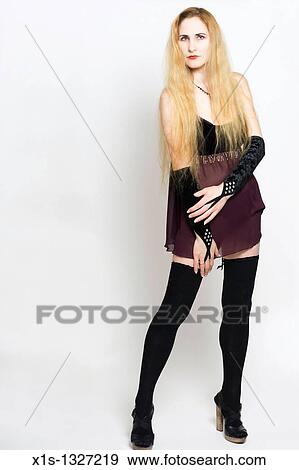 A fair skinned woman with very long blond hair View Large Photo Image Stock Photo - A fair skinned woman with very long blond hair. Fotosearch