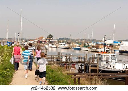 A family group walking at Walberswick in Suffolk, England, Britain, Uk View Large Photo Image Stock Image - A family group walking at Walberswick in Suffolk, England, Britain, Uk. Fotosearch