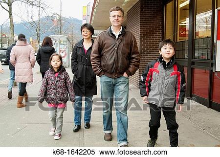 A family of four in North Vancouver, BC, Canada View Large Photo Image Stock Photography - A family of four in North Vancouver, BC, Canada. Fotosearch