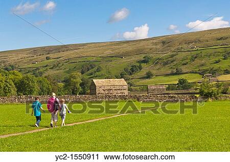 A family walking at Muker in Swaledale in North Yorkshire, England, Britain, Uk View Large Photo Image Stock Image - A family walking at Muker in Swaledale in North Yorkshire, England, Britain, Uk. Fotosearch