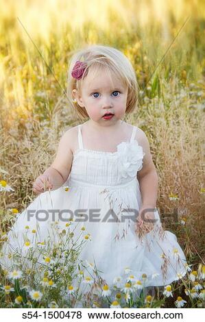 Stock Photo - A female caucasian toddler, 1-2 years old, near Fairfield, Washington, USA.. Fotosearch