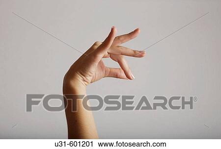 A flamenco dancer makes a gesture with her hands View Large Photo Image Stock Image - A flamenco dancer makes a gesture with her hands. Fotosearch