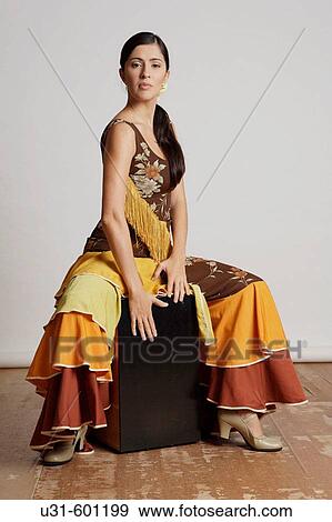 Stock Photo - A flamenco dancer plays the drums. Fotosearch