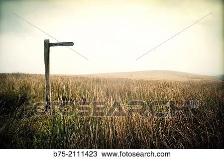 A Footpath post in the countryside indicating FP High Langber half ml. in Yorkshire Dales, England, UK, Europe. View Large Photo Image Stock Image - A Footpath post in the countryside indicating FP High Langber half ml. in Yorkshire Dales, England, UK, Europe.. Fotosearch