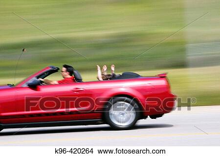 A fun day in a convertible View Large Photo Image Picture - A fun day in a convertible. Fotosearch