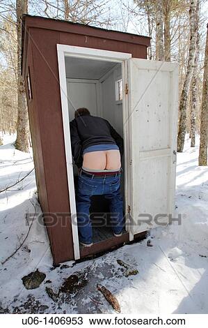 A funny picture of a man in an outhouse or toilet showing his buttocks View Large Photo Image Stock Image - A funny picture of a man in an outhouse or toilet showing his buttocks. Fotosearch