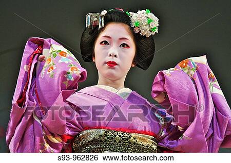 A Geisha dancing during the Kyoto Spring Geiko Dances View Large Photo Image Stock Photograph - A Geisha dancing during the Kyoto Spring Geiko Dances. Fotosearch