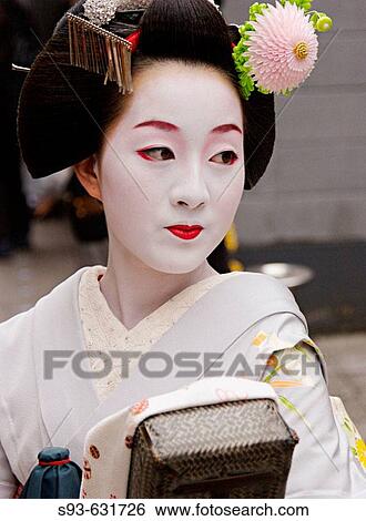 A geisha in Pontocho, a traditional Japanese night-time entertainment area. Kyoto. Japan. View Large Photo Image Stock Photograph - A geisha in Pontocho, a traditional Japanese night-time entertainment area. Kyoto. Japan.. Fotosearch