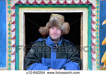 a German tourist in a traditionel tibetan house. View Large Photo Image Picture - a German tourist in a traditionel tibetan house.. Fotosearch