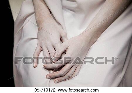 A girl's hands covered with white makeup View Large Photo Image Stock Image - A girl's hands covered with white makeup. Fotosearch