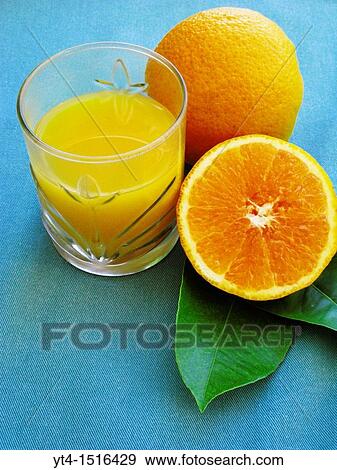Stock Photo - A Glass of Fresh Orange Juice. Fotosearch