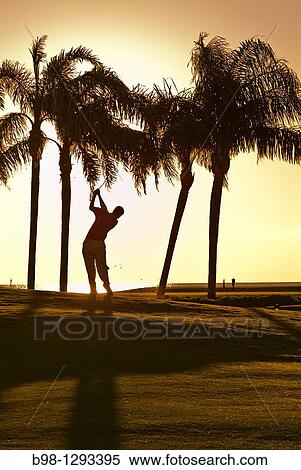 A golfer silhouette View Large Photo Image Stock Photography - A golfer silhouette. Fotosearch