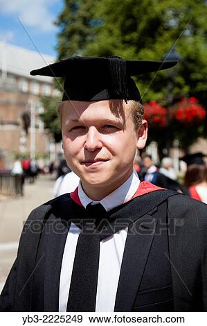 A Graduating Student From The University of Western England (UWE) At His Degree Ceremony At Bristol Cathedral, England. View Large Photo Image Stock Photo - A Graduating Student From The University of Western England (UWE) At His Degree Ceremony At Bristol Cathedral, England.. Fotosearch