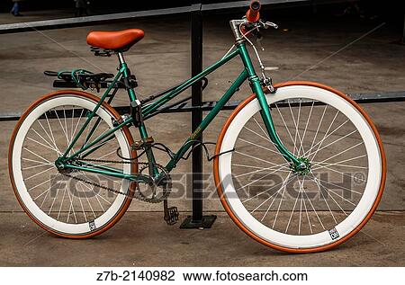A green bycicle near of Caixa Forum, Madrid city, Spain. View Large Photo Image Stock Image - A green bycicle near of Caixa Forum, Madrid city, Spain.. Fotosearch