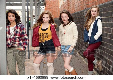 A group of 13 year old teenage girls, moody with attitude, UK View Large Photo Image Stock Photo - A group of 13 year old teenage girls, moody with attitude, UK. Fotosearch