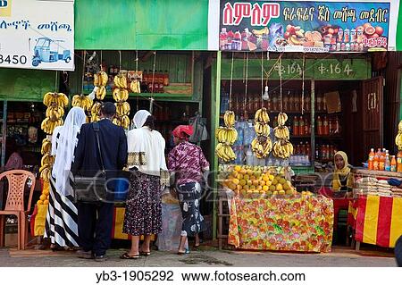 A group of Ethiopians buying fruit, Bahir Dar, Ethiopia View Large Photo Image Stock Image - A group of Ethiopians buying fruit, Bahir Dar, Ethiopia. Fotosearch