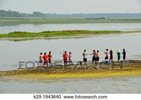 A group of fishermen, Devil's Lake, North Dakota, USA. View Large Photo Image Stock Image - A group of fishermen, Devil's Lake, North Dakota, USA.. Fotosearch