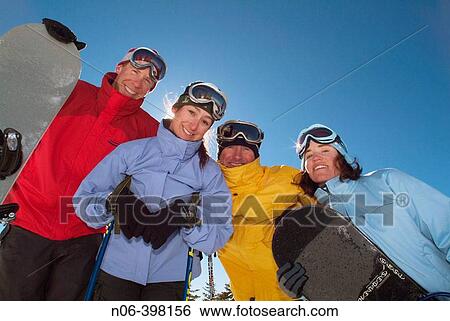 A group of friends skiing and snowboarding together at Diamond Peak. Nevada. USA View Large Photo Image Stock Photograph - A group of friends skiing and snowboarding together at Diamond Peak. Nevada. USA. Fotosearch