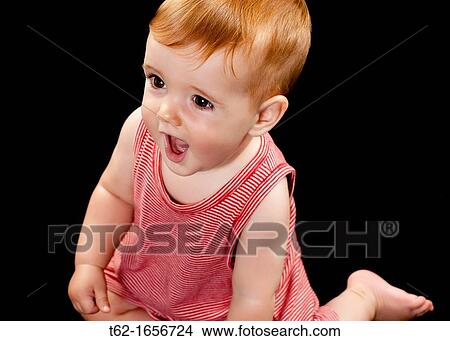A handsome baby crawls and plays alone View Large Photo Image Picture - A handsome baby crawls and plays alone. Fotosearch